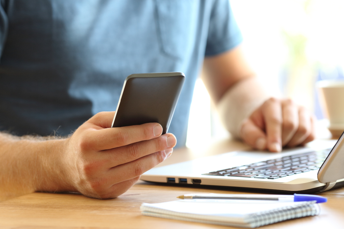 A man looking at his cellphone