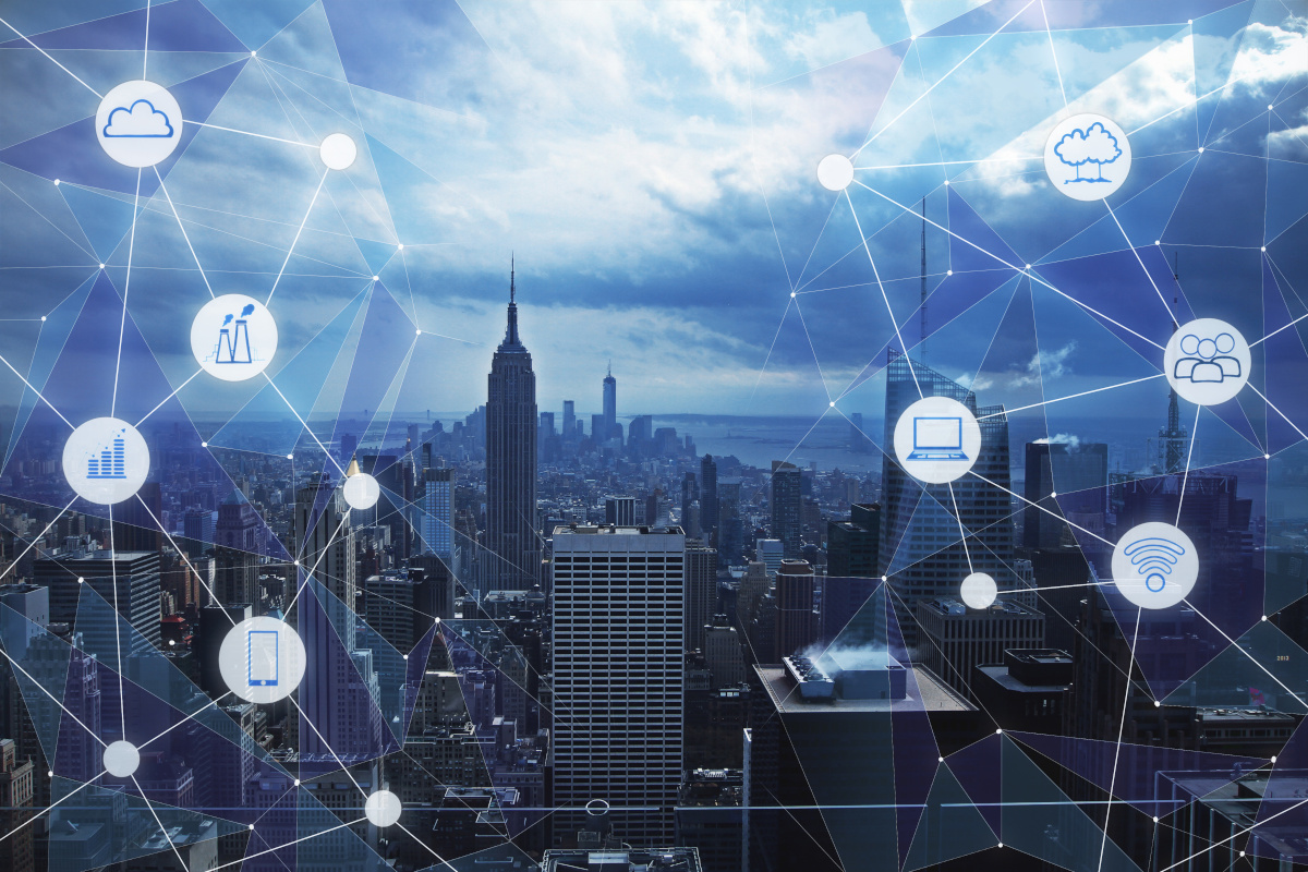 Modern city landscape with communications icons floating around