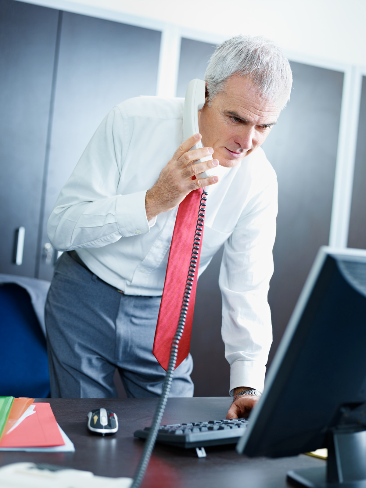 Businessman on Phone in Office Setting